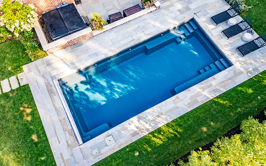 Drone view of a Leisure Pools inground fiberglass pool Leisure Pools Athens: Premium pool installations for Georgia